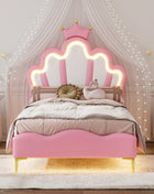 Comanlai Letto per bambini 90x200 cm con luce LED e testiera a forma di corona, letto imbottito con rete a doghe, pelle PU, bianco